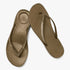 Pair of military olive Fit Flop I Qushion Ombre Sparkle sandals with rhinestone-studded straps, displayed from an elevated