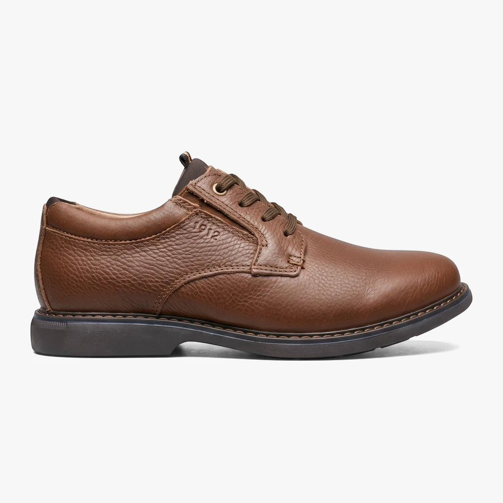 Brown Florsheim Mens Otto plain toe lace-up leather dress shoe, showcasing the textured leather and stitching details.
