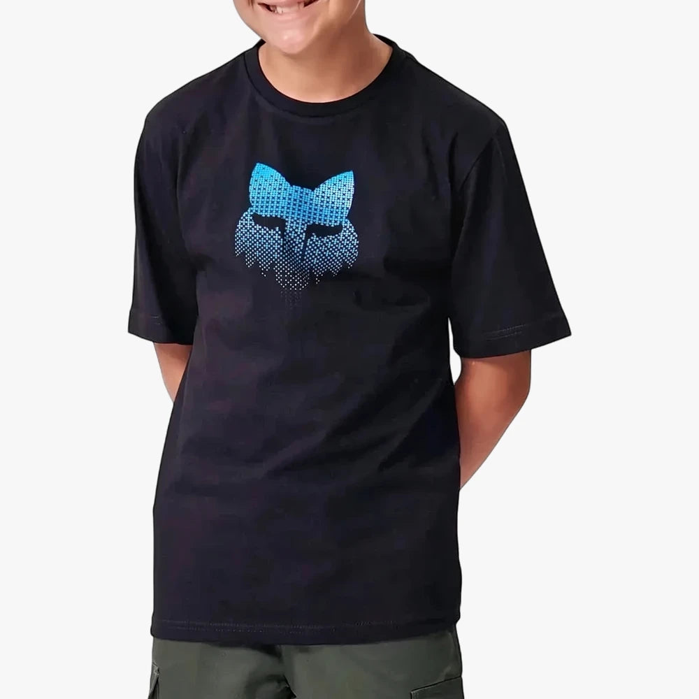 Fox Boys Blur Shortsleeve Tee in black worn by a young boy, featuring a blue pixelated Fox head logo. Styled with green