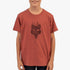 A boy models a Fox Boys Explore short sleeve tee in dark slate with a unique black graphic print.