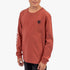 Young boy wearing a chestnut Fox Mixed Energy long sleeve tee with a black logo on the chest and white graphic on the sleeve.