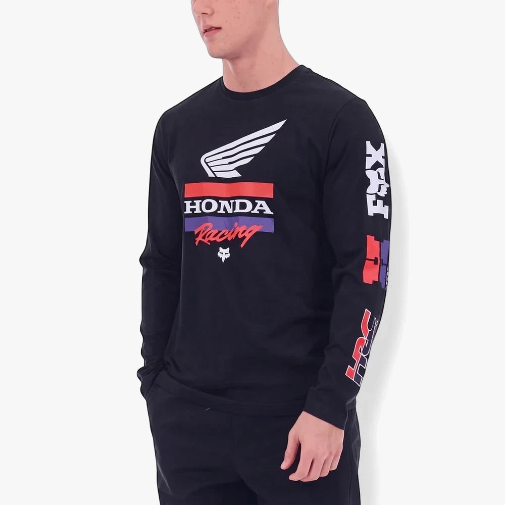 A black Fox Mens Honda Bar long sleeve tee shirt featuring white Honda wings and racing text, worn by a man.