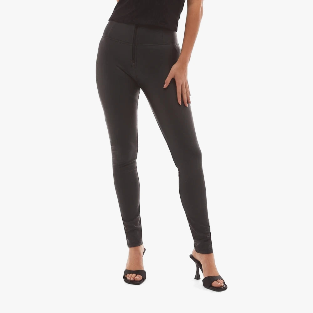 Black high waist full length Freddy Wr.Up faux leather leggings for women, styled with black mules.