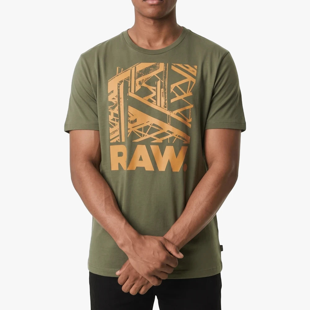 G Star Mens Raw Construction Short Sleeve Tee in sage green, featuring an orange architectural RAW graphic print, worn by a