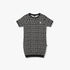 Black and white Guess girls active dress in a flat lay view, featuring an an all-over Guess logo print and short sleeves.