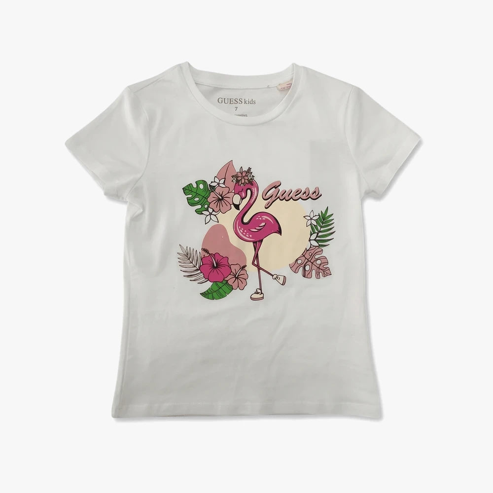 Guess Girls white short sleeve tee featuring a pink flamingo and tropical leaves graphic for kids.