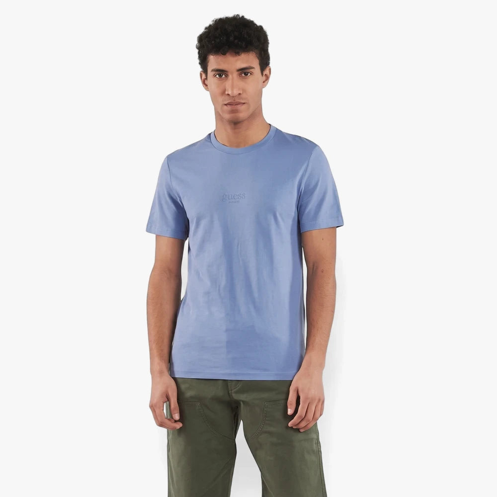 Male model wears a Guess Men&