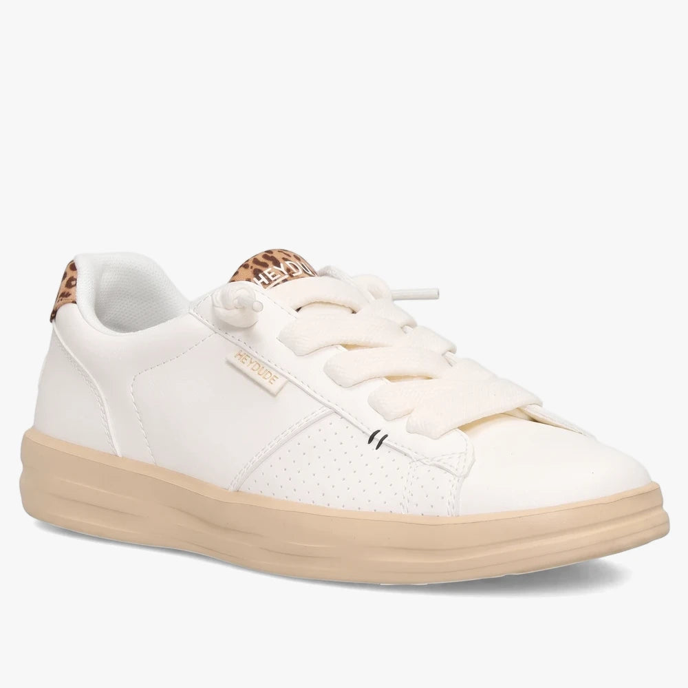 White Hey Dude Womens Karina Duo Classic Sneaker with leopard print accents and a tan sole, viewed from the side.