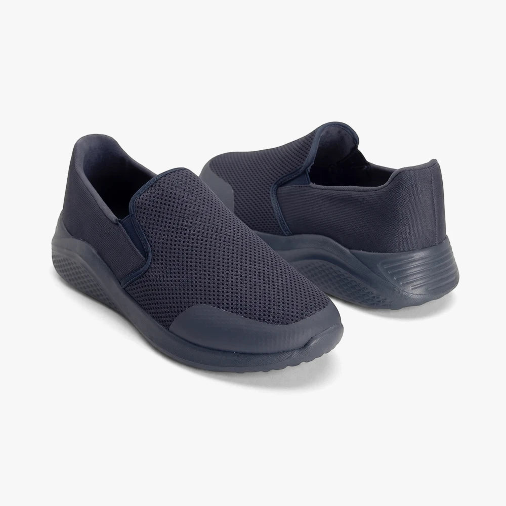 Hush Puppies Mens Zappo Navy Multi Mesh slip-on shoes in a close-up, showing the breathable mesh upper and durable sole.