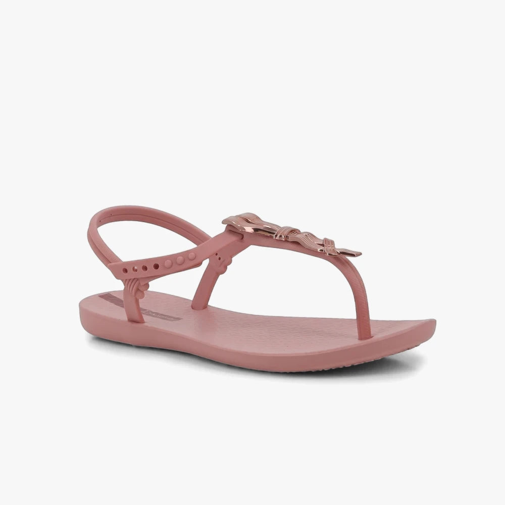 Ipanema Womens Class Charming pink thong sandal with an adjustable ankle strap and a metallic rose gold bow detail.