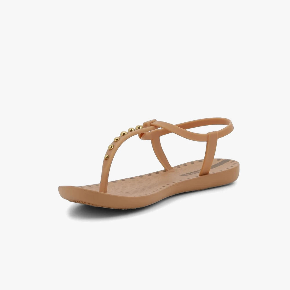 Ipanema Womens Class Dots Sandal in beige and gold, featuring a T-strap design with small gold studs, shown from a side