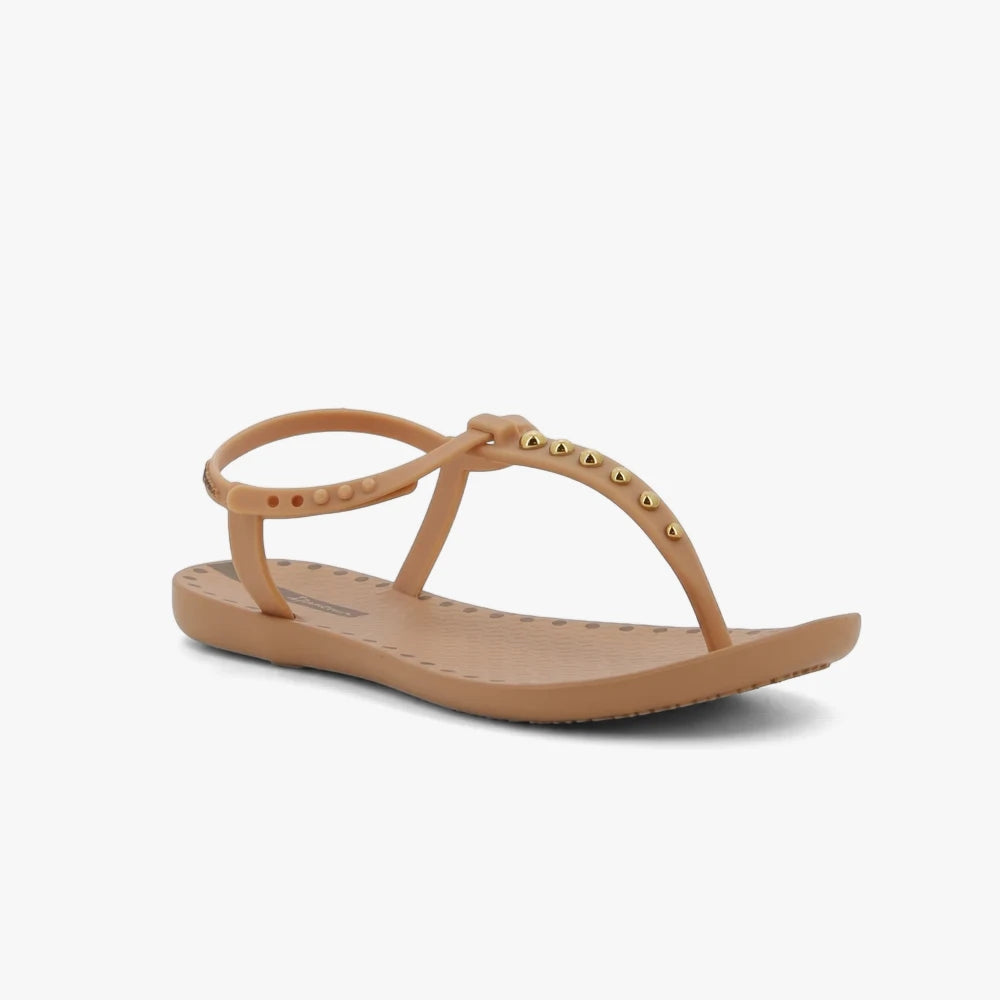 Ipanema Womens Class Dots Sandal in beige, featuring a thong strap adorned with gold studs and an adjustable ankle strap.