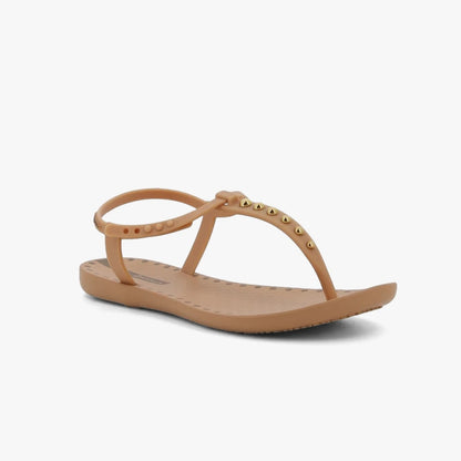 Ipanema Womens Class Dots Sandal in beige, featuring a thong strap adorned with gold studs and an adjustable ankle strap.