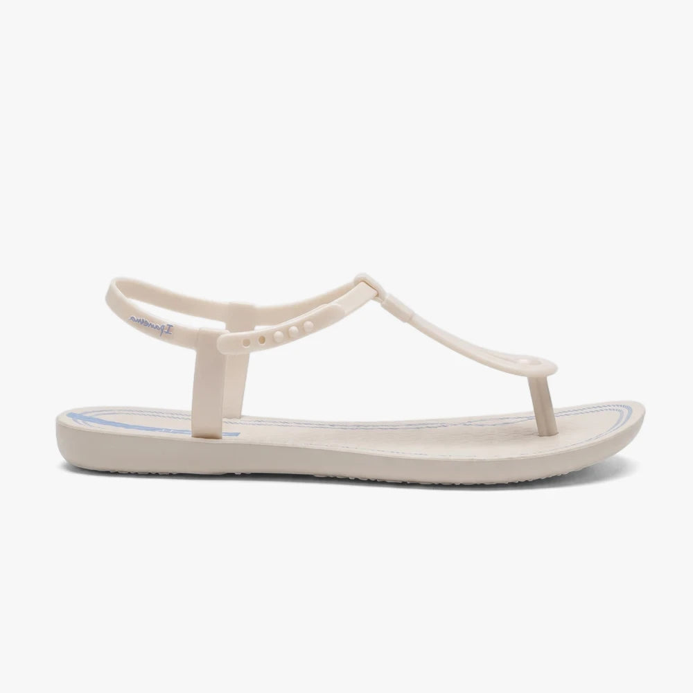 Ipanema Womens Class Slim Sandal in beige with blue detailing, featuring a T-strap design, shown from a side view.