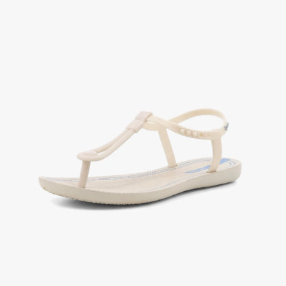 Ipanema Womens Class Slim Sandal in beige and blue, featuring a T-strap design and flat sole, shown from a side view.