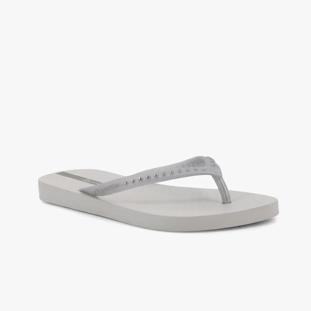 Ipanema Womens Essence Sandal in grey silver, featuring a studded strap and textured sole, positioned on a white background.