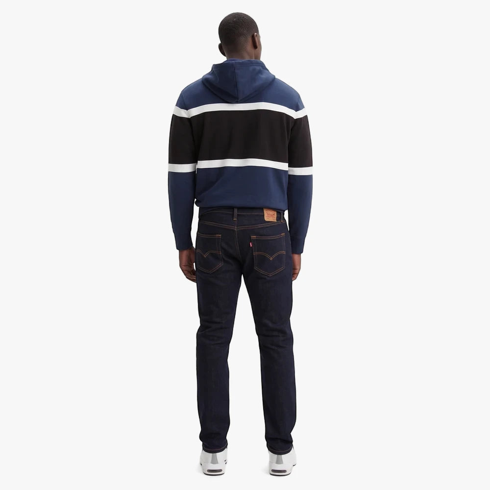 Rear view of a man wearing dark blue Levi&