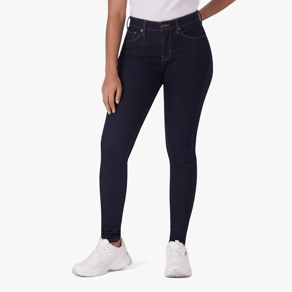 Levis Womens Curvy Super Skinny Jean in dark blue cast shadows denim, worn by a model from the waist down, showcasing the
