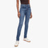 Model wearing blue Levis Womens Hirise Super Skinny Jeans, showcasing the skinny fit and wash. Paired with white sneakers on