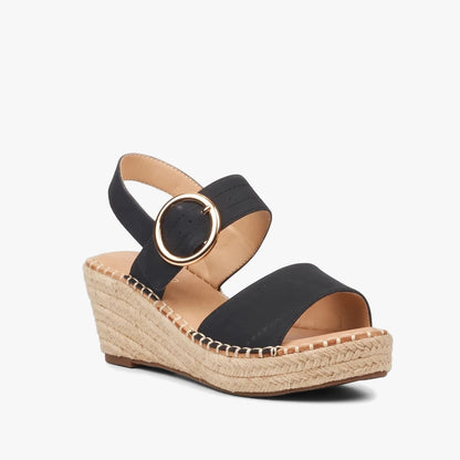 Miss Black Womens Jayda 9 black wedge sandal with an espadrille platform and a stylish gold buckle accent.