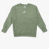 A green Nike girls long sleeve sweater, featuring a white Nike logo on the chest and ribbed cuffs and hem, displayed flat.