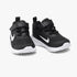 Black Nike Infant Boys Revolution 6 sneakers with white swooshes and soles, angled side by side.