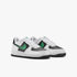 A pair of Nike Kids Air Force 1 sneakers in white, black, and green, displayed from a side view.