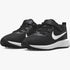 Black Nike Kids Revolution 6 sneakers with white swoosh logos and white soles, viewed from an angled perspective.