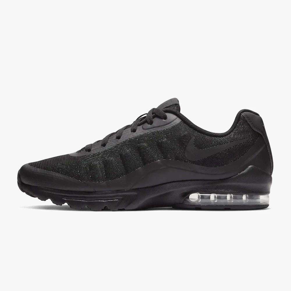 Nike Mens Air Max Invigor running shoe in black and anthracite, shown from a side view on a white background.