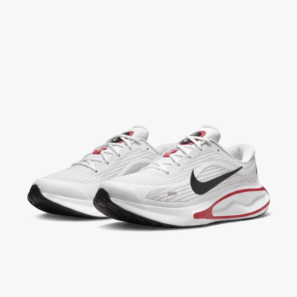 A pair of white and red Nike Men&
