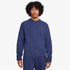 A male model wears a dark blue Nike Men&