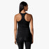 Black Nike Womens Tank Top on a woman, shown from the back, featuring a racerback design, paired with black leggings.