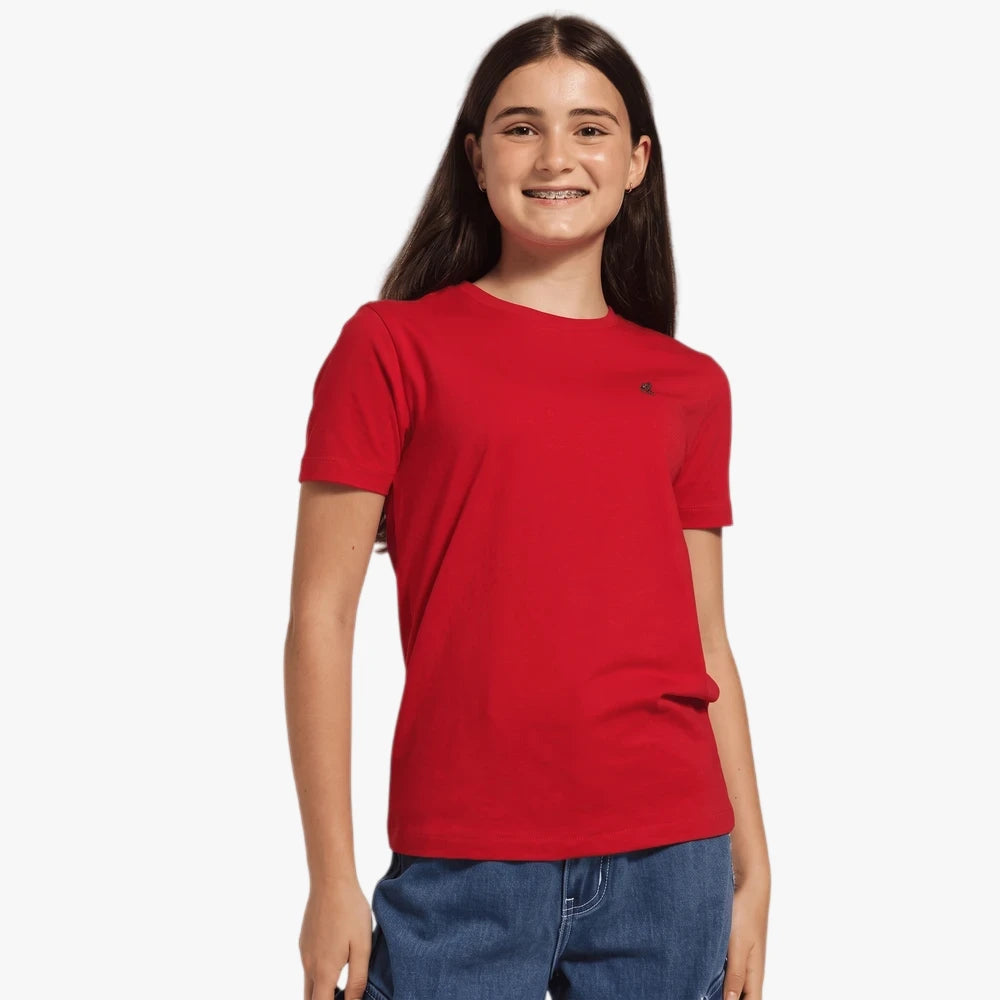 Polo Girls Kelly Short Sleeve Tee in red worn by a young girl with long dark hair and blue jeans.