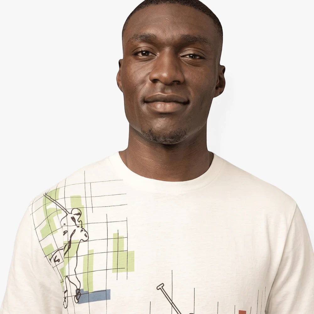 Headshot of a man wearing an off-white Polo men&