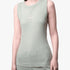 Close-up of a woman wearing a sage green ribbed Polo Thandiwe sleeveless tank top with a small pink embroidered logo.