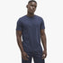 Navy Pringle Mens Ace short sleeve tee on a male model, showcasing the embossed brand logo on the chest and dark wash jeans.