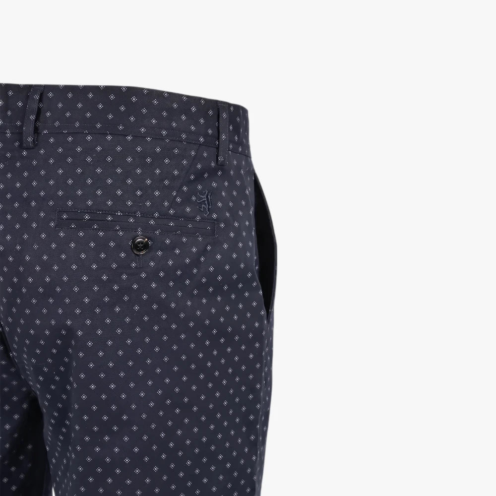 Pringle Mens Peter Printed Shorts in navy blue, featuring a subtle white diamond pattern and a buttoned back pocket with an