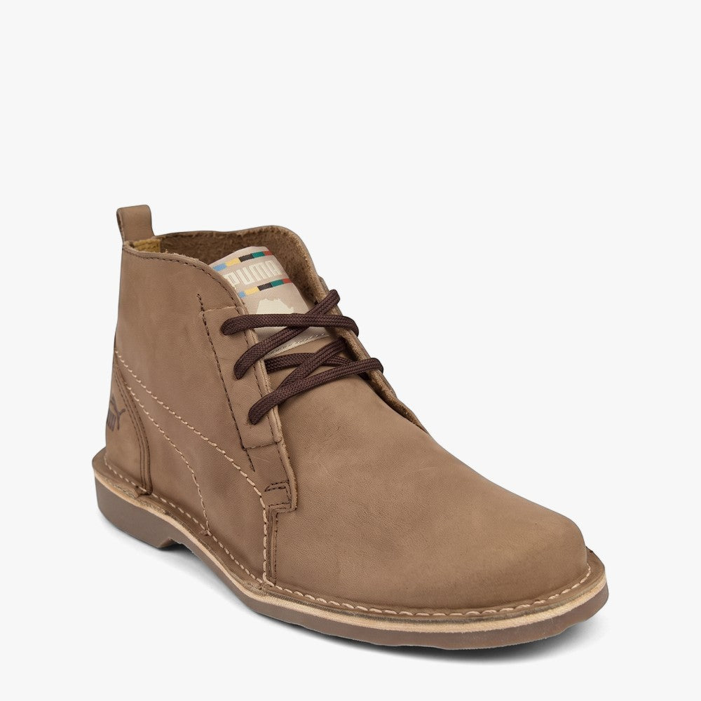 Puma Kids Jnr Terrae Mid Boot in chocolate chip brown, featuring a mid-cut leather design with laces.