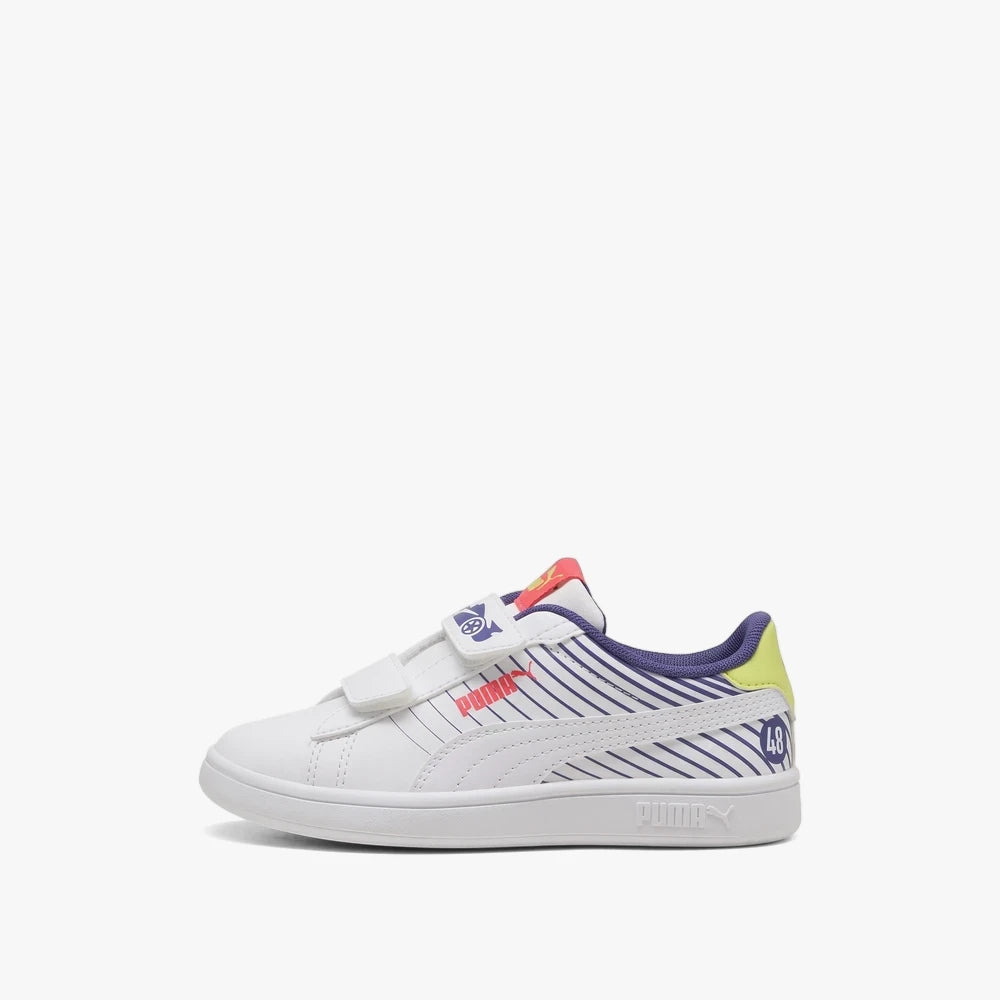 White Puma Kids Smash 3.0 Sneaker with blue stripes and red logo, featuring two white velcro straps and a side view.