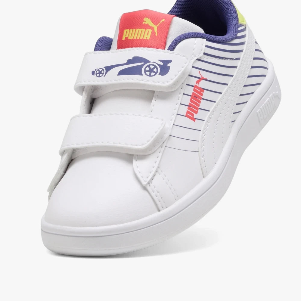 White Puma Kids Smash 3.0 sneakers for kids with blue racing car graphic, velcro straps, and red and blue accents.