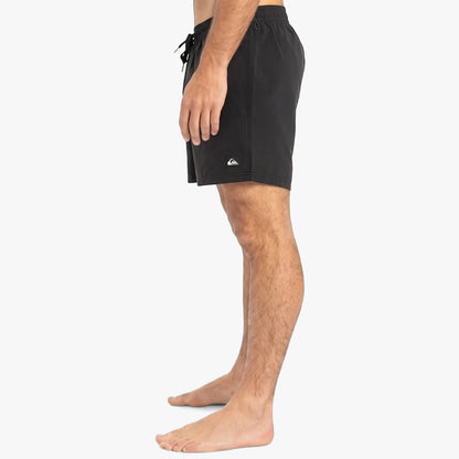 Mens black Quiksilver Everyday Solid Volley 15 inch shorts, shown worn by a model in a side profile view.