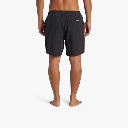 Back view of a man wearing black Quiksilver Everyday Vert Volley 2 17" shorts with an elastic waist and a back pocket.