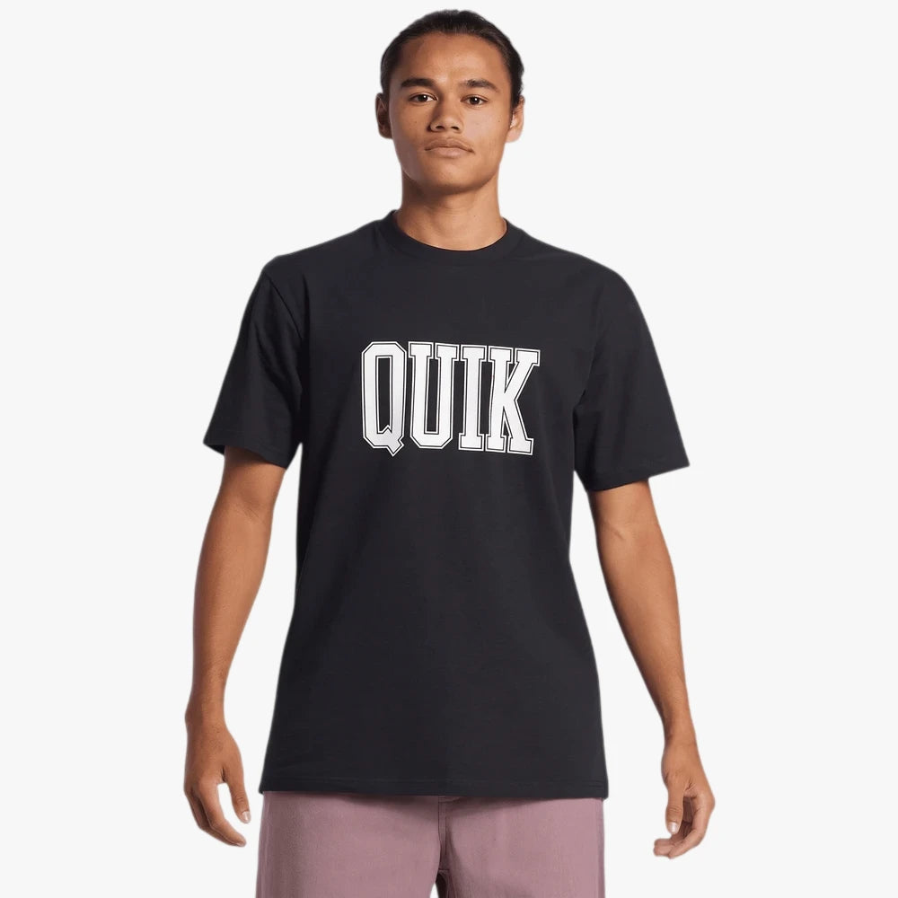 A male model wearing a black Quiksilver Griff short sleeve tee with a white &