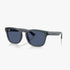 Ray-Ban sunglasses with transparent blue-grey frames and dark blue lenses, shown from a slightly elevated angle.