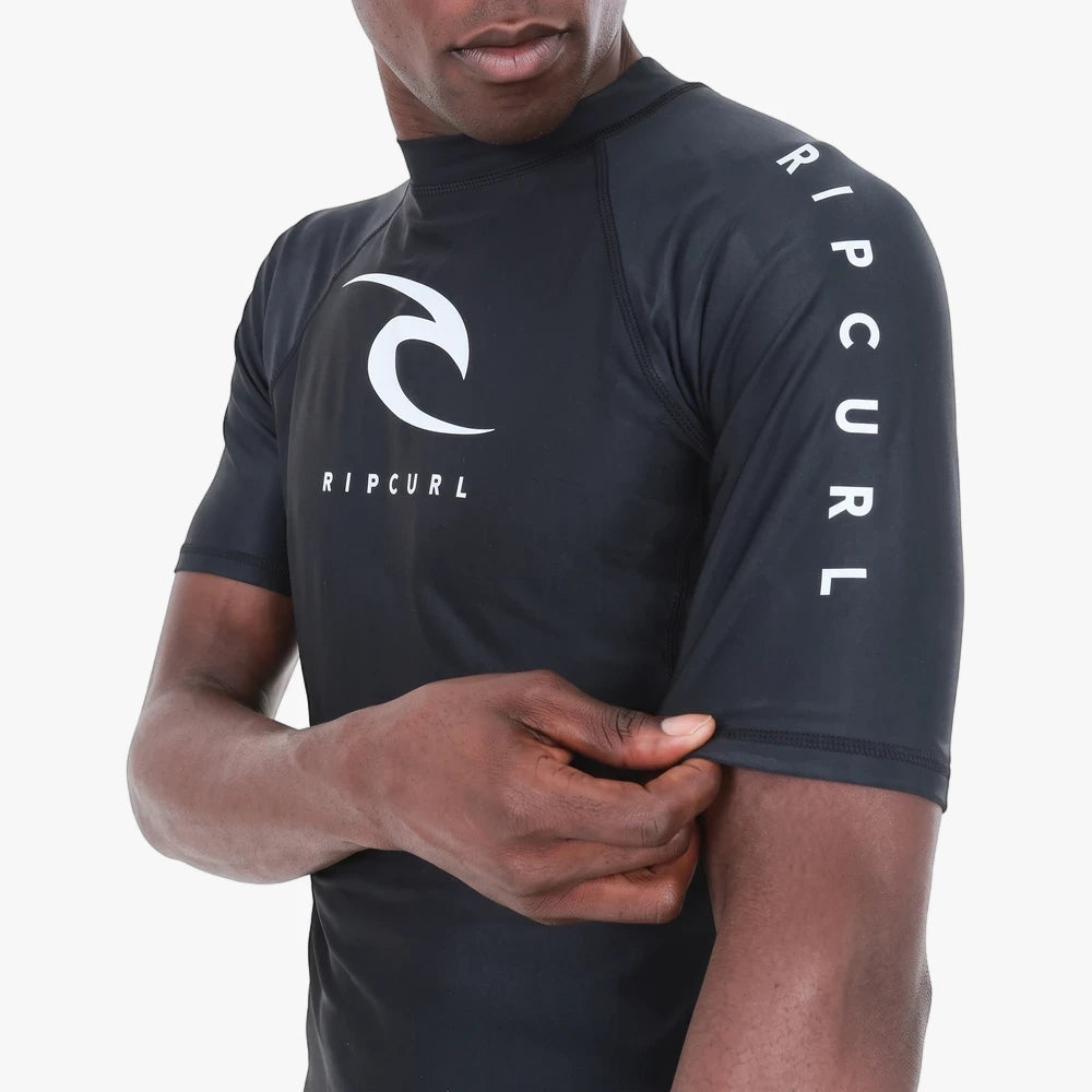 Close-up of a man wearing a black Ripcurl Men&