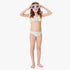 Young girl wearing a Roxy Girls Fairy Beach Flutter Set Sunshine Little Hibis light green and pink floral two-piece bikini,