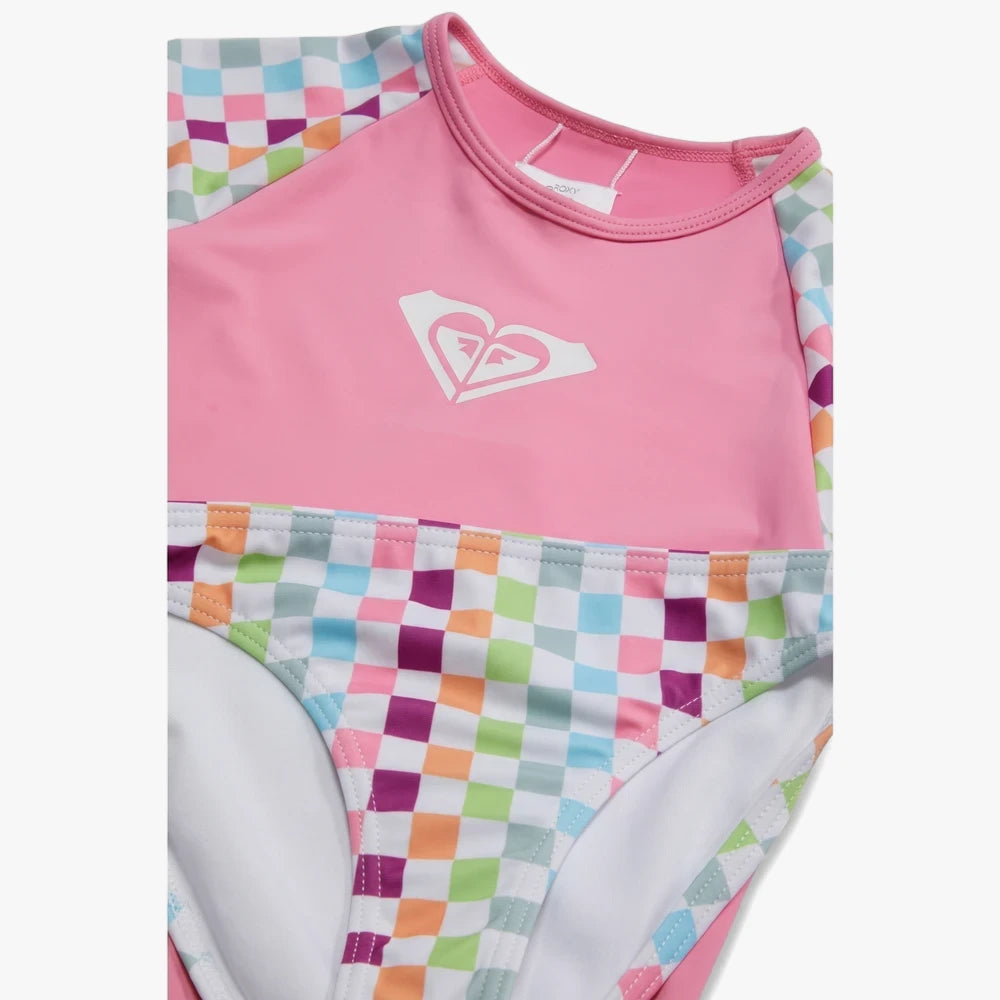 Roxy Girls Rainbow Check Long Sleeve Swim Set in pink and rainbow checkerboard pattern, shown folded.