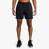 A full body image of a man wearing black Rvca Mens Yogger 17" Stretch Shorts and black sneakers, posing on a white