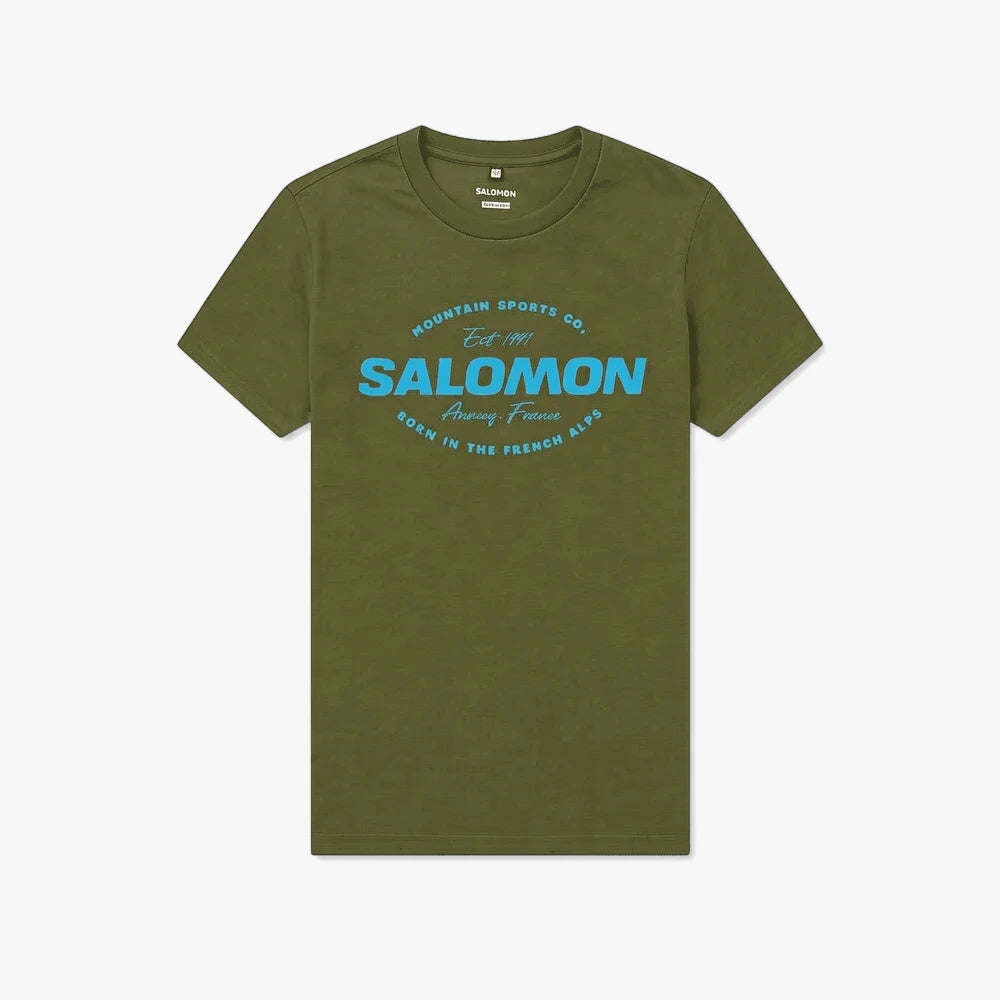 Salomon Mens Cruiser Short Sleeve Tee in dark olive, featuring a prominent blue brand graphic on the chest. Flat lay view.