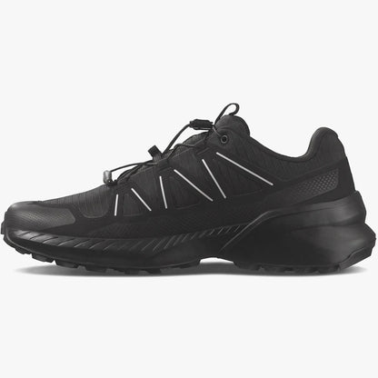 Black Salomon Mens Speedcross Peak Trail Sneaker with white accents and speed lacing system, side view.
